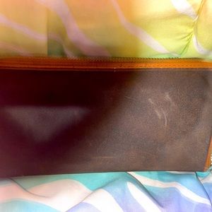 Brown and tan Michael Kors wallet